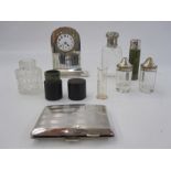 1930s silver rectangular cigarette case initialled BCF, 2oz, a silver mounted mantel clock, a silver