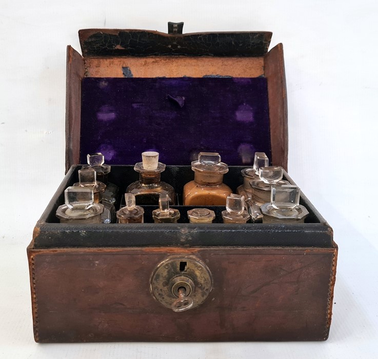 A 19th Century leather cased medicine box, with fitted compartments, glass medicine bottle, four