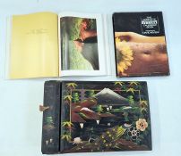 An Oriental lacquered photograph album (unused) and 'The complete Pirelli Calendar Book' (2)