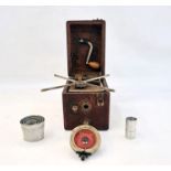 A Peter Pan Gramophone with folding record platform and collapsing alloy horn in leather and