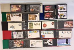 Twelve stamp albums, FDCs and PHQ cards from Jersey and Isle of Man (1 box)