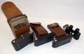 A Kodak No. 3 folding pocket camera model G, in fitted case, two other folding cameras in fitted