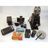 A folding camera, binoculars, a pair of Telebinoculars (boxed), a reel, Robin Hood camera and