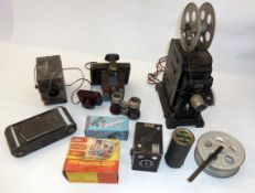 A folding camera, binoculars, a pair of Telebinoculars (boxed), a reel, Robin Hood camera and