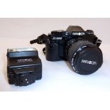 Minolta X-300 camera with Minolta MD zoom lens, in case