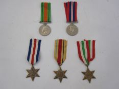 WITHDRAWN   Collection of WWII medals France and Germany Star, Italy Star, Africa Star, Defence