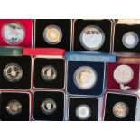 Eighteen various silver proof coins some Pie-forts, eleven GB silver proof crowns, 125 silver