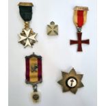 Masonic interest; masonic medals to include a red enamel and silver cross, white enamel star,