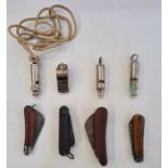 Four pen knives one having a horn handle, police whistle with three others