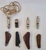 Four pen knives one having a horn handle, police whistle with three others