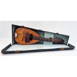 Stained wood and inlaid mandolin in original case  Condition ReportNo maker's label; please see