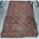 A Persian style rug, red ground with elephant gold to centre with multi borders.Measurements 204/132