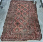 A Persian style rug, red ground with elephant gold to centre with multi borders.Measurements 204/132