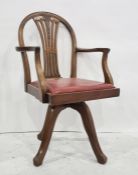 Early 20th century mahogany office swivel chair with carved and pierced backsplats, red leather