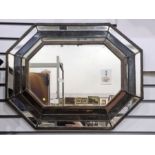 Wall mirror of elongated octagonal form in multi plate mirrored frame, probably early 20th