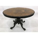 Victorian walnut looe table with moulded edge, on turned and carved central column to four