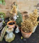 Various garden ornaments and planters including large three-handled anphora-style planter