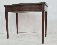 Reproduction mahogany serpentine-fronted two-drawer side table on square section tapering supports