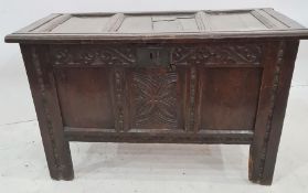 Mid-17th century oak coffer, the top with three plain panels interspersed by moulded stiles, over