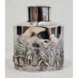 Early 20th century silver tea canister of oval straight-sided form, with repousse decoration of