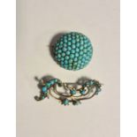 Gold-coloured and turquoise circular brooch with turquoise beads inset and another gold-coloured and