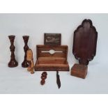 Pair of turned wooden candlesticks, a carved wooden box, another, a wallet depicting pyramids to