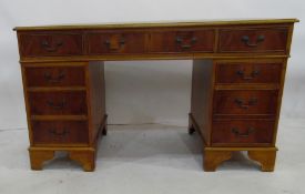 20th century pedestal desk with green leather inset top, moulded edge above eight assorted