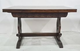 20th century oak rectangular extending dining table on trestle-style base