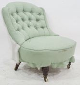 19th century chair in pale green upholstery, turned and ring front legs to brass caps and castors