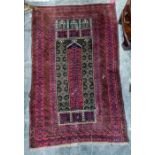 A Persian rug, red ground with cream blue and white design and multi border. Measurements 138/87cm