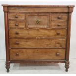 Scottish mahogany chest of eight assorted drawers including central bonnet drawer, the breakfront