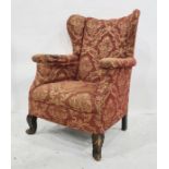 Victorian wingback chair, red ground with gold-patterned upholstery, cabriole front legs