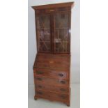 20th century yew bureau bookcase with moulded cornice, astragal glazed doors, inlaid fall, four