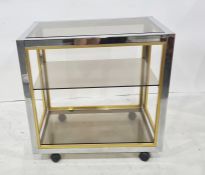 Chrome and glass three-tier tea trolley on castors, 70cm x 69cm