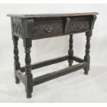 Possibly 18th century two-drawer side table, the rectangular top with moulded edge above two drawers