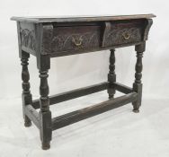 Possibly 18th century two-drawer side table, the rectangular top with moulded edge above two drawers