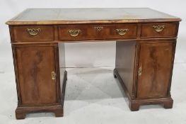 Victorian, Georgian-style mahogany pedestal desk, the rectangular top with canted corners and