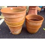 Five terracotta plant pots
