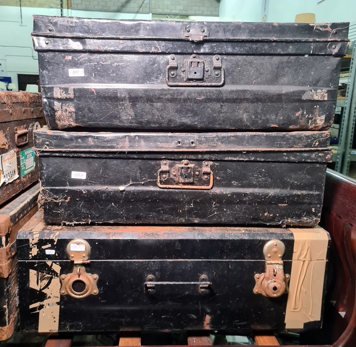 Two vintage metal travelling trunks and another (3)