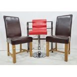 Set of six brown leatherette covered dining chairs and two bar stools in red leatherette and