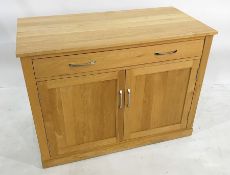 Modern oak desk, the rectangular top with pull-out sliding keyboard drawer, above two cupboard