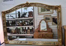 Overmantel mirror with arched top, in gilt-effect frame, 127cm x 85cm