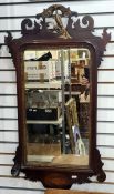 19th century mahogany fretwork carved mirror, the top carved with hoho bird, the bottom with shell