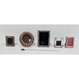 Pair of 20th century miniature silver square-framed picture frames, a circular mounted picture frame