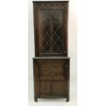 20th century oak corner display unit with leaded glazed doors on base of single cupboard door