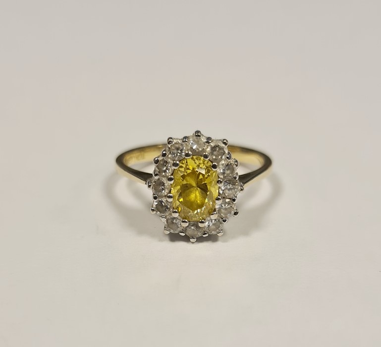 Gold, yellow and white stone cluster ring, gold mark 585, oval yellow stone surrounded by a