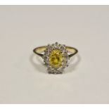 Gold, yellow and white stone cluster ring, gold mark 585, oval yellow stone surrounded by a