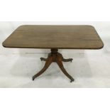 Circa 1820 mahogany breakfast table, the rounded rectangular top with chequered banding and