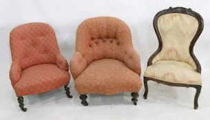 Low Victorian chair in peach ground foliate upholstery and two further chairs (3)