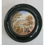 Pot lid mounted in circular black frame, labelled to reverse '188 Strathfieldsaye', decorated with